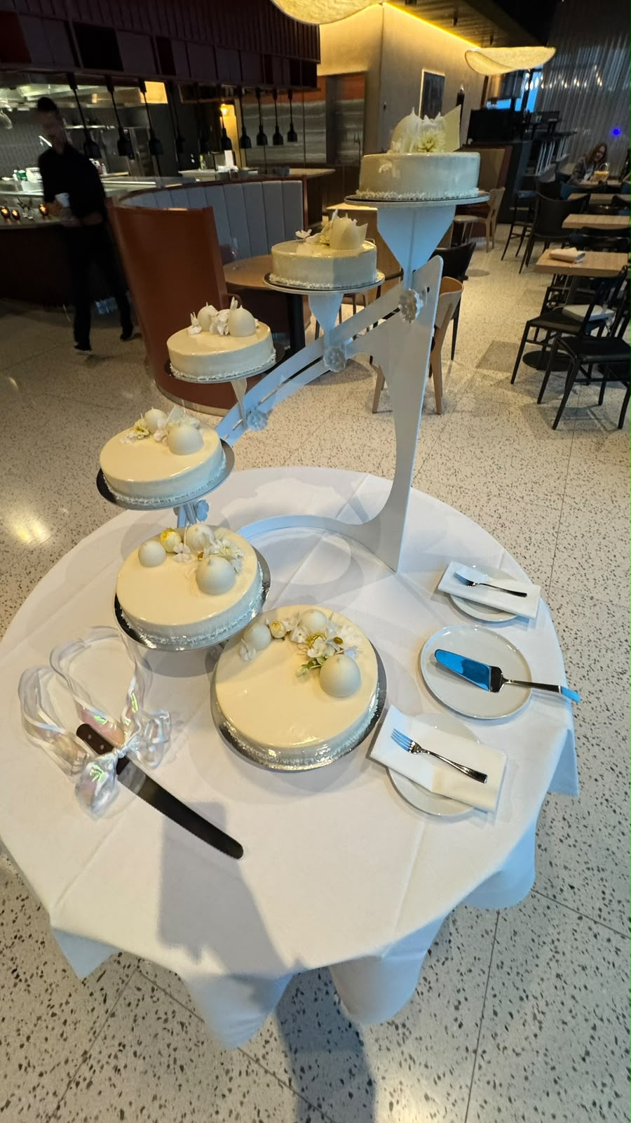 Wedding cakes displayed on a tiered stand